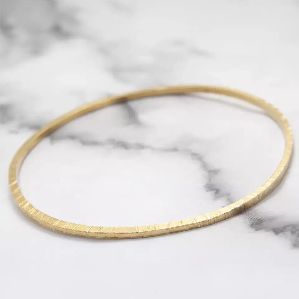 9ct yellow gold plated silver textured bangle