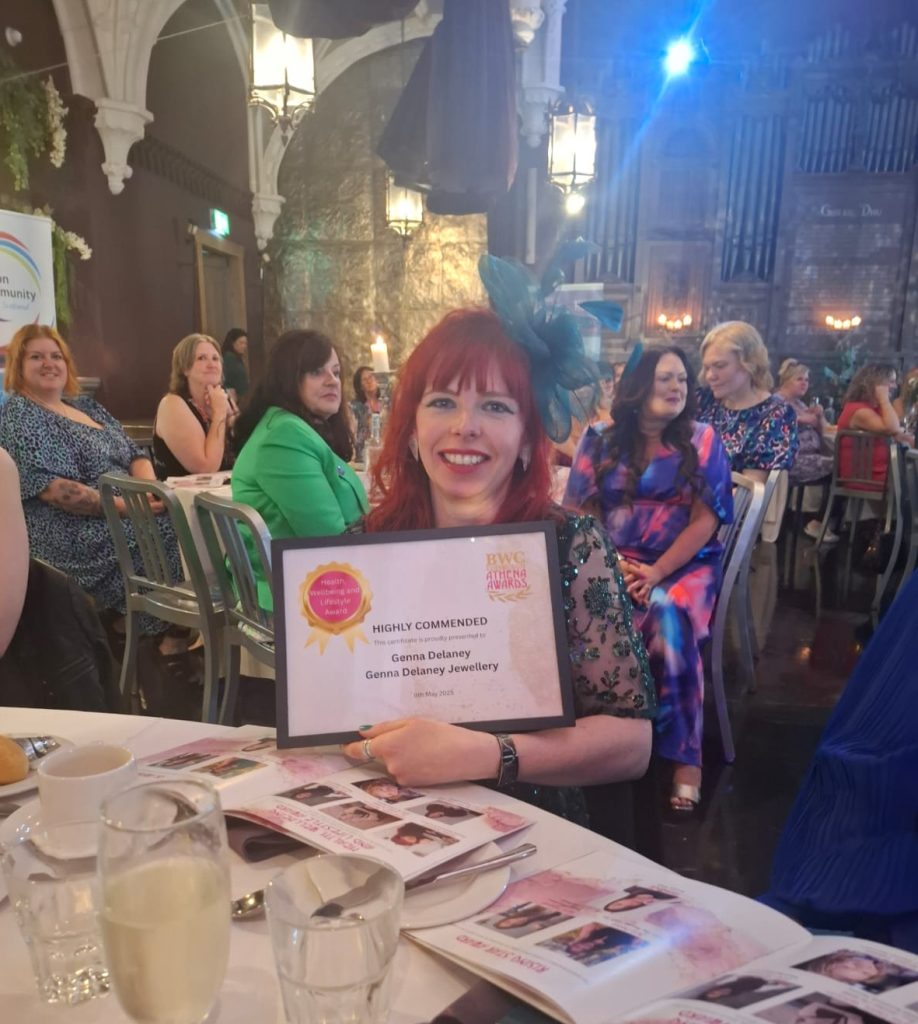 me holding my award